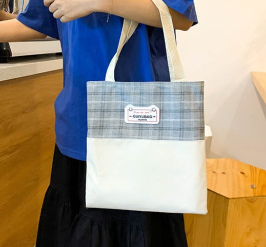 blue tote bag, lightweight, functional, simple design, casual for school